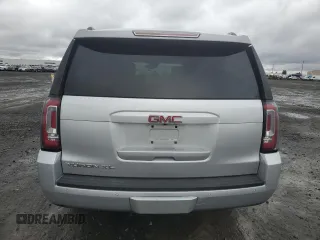 2015 GMC Yukon XL SLT with VIN 1GKS2HKC8FR616031, listed as a Copart auction lot 48740785 with 128,467 mi miles and Salvage Title. Bid and sale history available at carsss.com. Image 6.