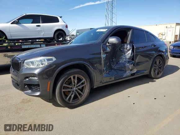 2020 BMW X4 xDrive30i with VIN 5UX2V1C04L9C32419, listed as a Copart auction lot 46427975 with 58,623 mi miles and Salvage Title. Bid and sale history available at carsss.com. Image 1.