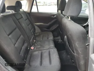 2015 Mazda CX-5 Touring with VIN JM3KE4CY0F0517821, listed as a Copart auction lot 53937195 with 165,852 mi miles and Salvage Title. Bid and sale history available at DreamBid. Image 11.