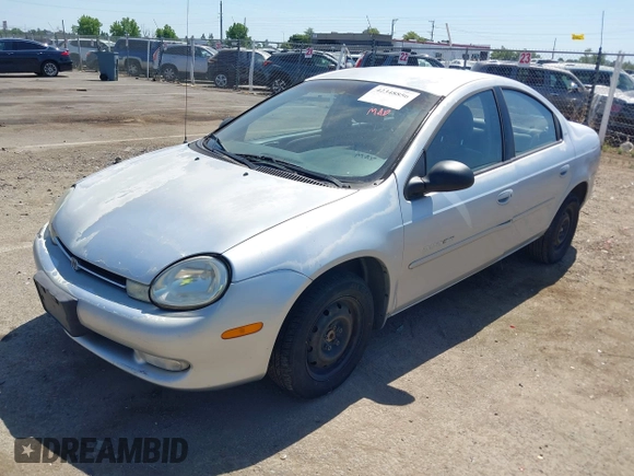 2000 Dodge Neon Highline z VIN 1B3ES46C4YD556519, wystawiony jako IAAI lot #42348856 z przebiegiem 183 923 mil mil oraz . Historia ofert i sprzedaży dostępna na DreamBid. Obrazek 2.