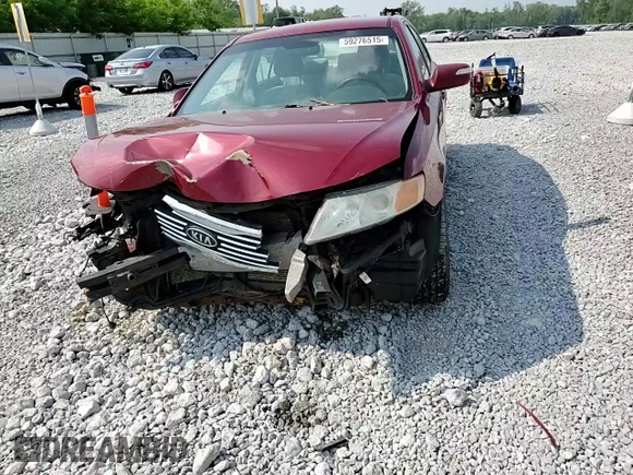 2009 Kia Optima LX z VIN KNAGE228795334599, wystawiony jako Copart lot #59276515 z przebiegiem 180 399 mil mil oraz Szkoda całkowita • Salvage title. Historia ofert i sprzedaży dostępna na DreamBid. Obrazek 14.