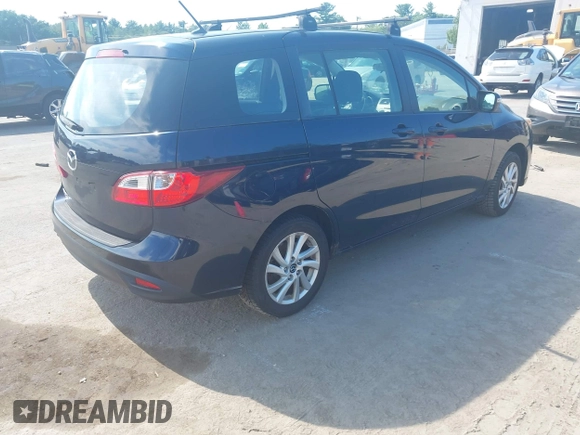 2015 Mazda 5 Sport with VIN JM1CW2BLXF0182264, listed as a IAAI auction lot 42638417 with 142,003 mi miles and . Bid and sale history available at DreamBid. Image 4.