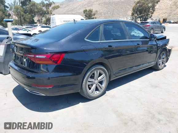 2019 Volkswagen Jetta S z VIN 3VWC57BU1KM116991, wystawiony jako IAAI lot #42377777 z przebiegiem 70 910 mil mil oraz . Historia ofert i sprzedaży dostępna na DreamBid. Obrazek 4.