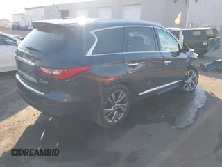 2014 Infiniti QX60 with VIN 5N1AL0MM5EC543581, listed as a IAAI auction lot 41336591 with 116,271 mi miles and . Bid and sale history available at DreamBid. Image 4.