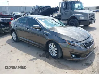 2015 Kia Optima EX z VIN 5XXGN4A71FG400773, wystawiony jako IAAI lot #42055819 z przebiegiem 102 913 mil mil oraz . Historia ofert i sprzedaży dostępna na DreamBid. Obrazek 1.