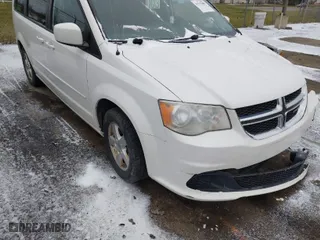 2012 Dodge Grand Caravan SXT with VIN 2C4RDGCG9CR115347, listed as a IAAI auction lot 41217698 with NaN miles. Bid and sale history available at carsss.com. Image 1.