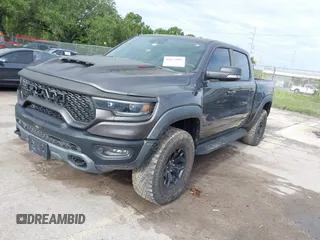 2021 Ram 1500 TRX with VIN 1C6SRFU98MN820577, listed as a IAAI auction lot 42652005 with 43,429 mi miles and . Bid and sale history available at DreamBid. Image 2.