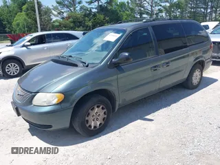 2003 Chrysler Town & Country LX with VIN 2C4GP44R53R385043, listed as a IAAI auction lot 42130516 with 252,056 mi miles. Bid and sale history available at carsss.com. Image 2.