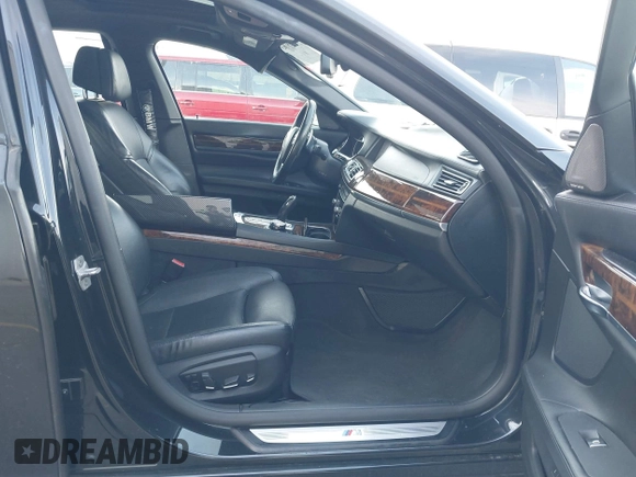 2015 BMW 7 Series 750Li xDrive with VIN WBAYF8C55FD654949, listed as a IAAI auction lot 41659763 with 91,837 mi miles and . Bid and sale history available at carsss.com. Image 5.
