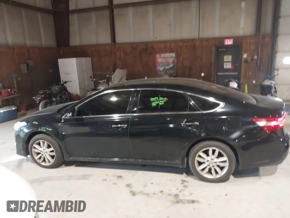 2014 Toyota Avalon Limited with VIN 4T1BK1EB0EU114093, listed as a IAAI auction lot 41311332 with 103,479 mi miles and . Bid and sale history available at DreamBid. Image 14.