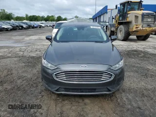 2020 Ford Fusion SE z VIN 3FA6P0HD1LR252332, wystawiony jako Copart lot #58123365 z przebiegiem 76 410 mil mil oraz Szkoda całkowita • Salvage title. Historia ofert i sprzedaży dostępna na DreamBid. Obrazek 5.