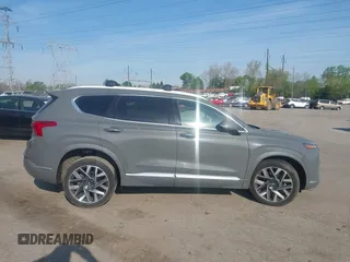 2021 Hyundai Santa Fe Calligraphy with VIN 5NMS5DAL8MH370726, listed as a IAAI auction lot 42099412 with 56,273 mi miles. Bid and sale history available at carsss.com. Image 13.