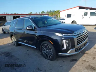 2024 Hyundai Palisade Calligraphy z VIN KM8R74GE2RU677273, wystawiony jako IAAI lot #41989335 z przebiegiem 9 200 mil mil oraz . Historia ofert i sprzedaży dostępna na DreamBid. Obrazek 1.