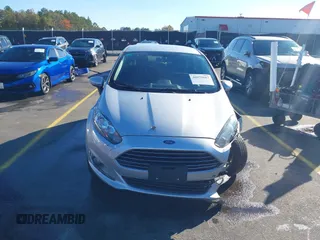 2019 Ford Fiesta SE with VIN 3FADP4EJ0KM107058, listed as a IAAI auction lot 40979683 with 116,854 mi miles. Bid and sale history available at carsss.com. Image 12.