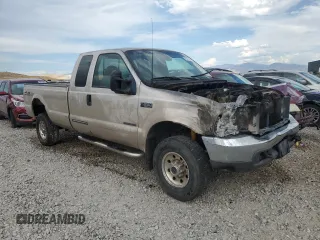 1999 Ford Super Duty F-250 XL with VIN 1FTNX21F8XEE00658, listed as a Copart auction lot 70021594 with 218,084 mi miles and Non Repairable. Bid and sale history available at carsss.com. Image 4.
