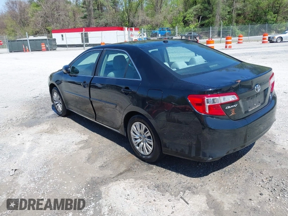 2014 Toyota Camry L with VIN 4T4BF1FK9ER408973, listed as a IAAI auction lot 42074491 with 183,934 mi miles and . Bid and sale history available at DreamBid. Image 3.