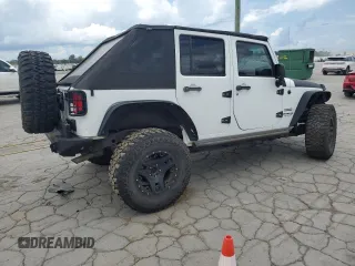2015 Jeep Wrangler Unlimited Sport с VIN 1C4BJWDG3FL570131, выставлен на аукционе Copart как лот 64418415 с пробегом 112 362 миль миль и Списание • Salvage title. История ставок и продаж доступна на DreamBid. Изображение 3.