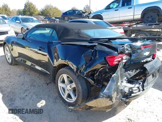 2019 Chevrolet Camaro 1LT with VIN 1G1FB3DS2K0104079, listed as a IAAI auction lot 41632830 with 63,553 mi miles. Bid and sale history available at carsss.com. Image 3.