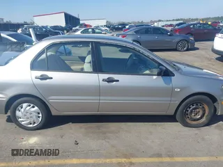 2003 Mitsubishi Lancer ES with VIN JA3AJ26E63U007501, listed as a IAAI auction lot 41771016 with 146,984 mi miles. Bid and sale history available at carsss.com. Image 13.