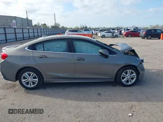 2017 Chevrolet Cruze LT with VIN 1G1BE5SM1H7165431, listed as a IAAI auction lot 41777097 with 101,321 mi miles and . Bid and sale history available at DreamBid. Image 13.