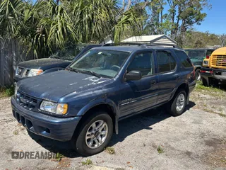 2002 Isuzu Rodeo S z VIN 4S2CK58W124324362, wystawiony jako Copart lot #49668045 z przebiegiem Nie podano mil oraz Czysty tytuł • Clean title. Historia ofert i sprzedaży dostępna na DreamBid. Obrazek 2.