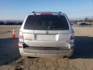 2008 Mercury Mariner Premier z VIN 4M2CU97108KJ43593, wystawiony jako Copart lot #62006105 z przebiegiem 124 233 mil mil oraz Szkoda całkowita • Salvage title. Historia ofert i sprzedaży dostępna na DreamBid. Obrazek 6.