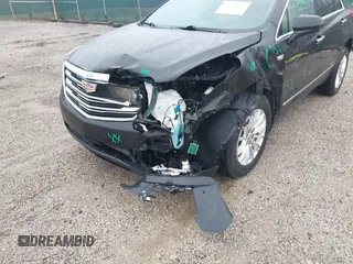 2018 Cadillac XT5 FWD with VIN 1GYKNARS6JZ160993, listed as a IAAI auction lot 41472847 with 113,415 mi miles. Bid and sale history available at carsss.com. Image 6.