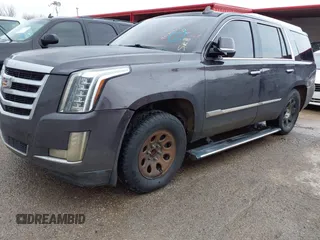 2015 Cadillac Escalade Premium z VIN 1GYS3NKJ5FR540221, wystawiony jako IAAI lot #41289989 z przebiegiem 100 191 mil mil oraz . Historia ofert i sprzedaży dostępna na DreamBid. Obrazek 19.