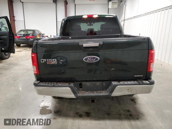 2015 Ford F-150 XLT z VIN 1FTEW1E81FKE92611, wystawiony jako Copart lot #55768005 z przebiegiem 118 600 mil mil oraz Szkoda całkowita • Salvage title. Historia ofert i sprzedaży dostępna na DreamBid. Obrazek 6.