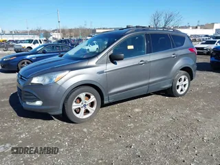 2014 Ford Escape SE with VIN 1FMCU0GXXEUB37821, listed as a IAAI auction lot 41853052 with 197,773 mi miles. Bid and sale history available at carsss.com. Image 2.