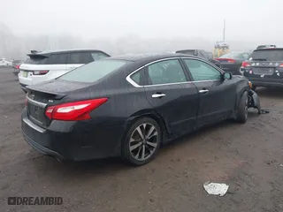 2016 Nissan Altima 2.5 SL with VIN 1N4AL3AP8GC209767, listed as a IAAI auction lot 38190423 with 95,899 mi miles. Bid and sale history available at carsss.com. Image 4.