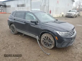 2022 Volkswagen Tiguan SE with VIN 3VV3B7AX2NM030909, listed as a Copart auction lot 53622025 with 128,210 mi miles and Clean title. Bid and sale history available at DreamBid. Image 4.