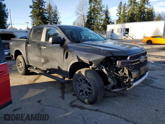 2024 Ford Ranger XLT with VIN 1FTER4HH2RLE26605, listed as a Copart auction lot 87441114 with 6,731 mi miles and Salvage Title. Bid and sale history available at carsss.com. Image 4.
