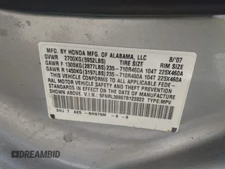 2007 Honda Odyssey Touring with VIN 5FNRL38867B122822, listed as a IAAI auction lot 42145685 with 212,164 mi miles. Bid and sale history available at carsss.com. Image 9.