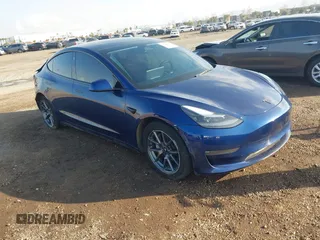 2022 Tesla Model 3 Long Range z VIN 5YJ3E1EB5NF152217, wystawiony jako IAAI lot #41444283 z przebiegiem 70 087 mil mil oraz . Historia ofert i sprzedaży dostępna na DreamBid. Obrazek 1.