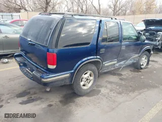 1999 Chevrolet Blazer LS with VIN 1GNDT13W0X2223207, listed as a IAAI auction lot 41352241 with 239,263 mi miles. Bid and sale history available at carsss.com. Image 4.