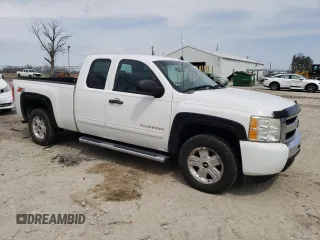 2010 Chevrolet Silverado 1500 LT with VIN 1GCSKSE30AZ142007, listed as a Copart auction lot 53021765 with 100,698 mi miles and Salvage Title. Bid and sale history available at DreamBid. Image 4.