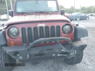 2008 Jeep Wrangler Unlimited X z VIN 1J4GA39128L568988, wystawiony jako IAAI lot #42445403 z przebiegiem 198 032 mil mil oraz . Historia ofert i sprzedaży dostępna na DreamBid. Obrazek 6.