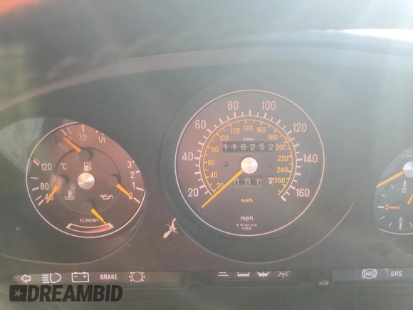 1989 Mercedes-Benz 560 SL с VIN WDBBA48D4KA104474, выставлен на аукционе Copart как лот 76584374 с пробегом 118 252 миль миль и Списание • Salvage title. История ставок и продаж доступна на DreamBid. Изображение 9.