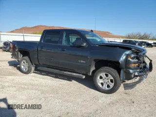 2018 Chevrolet Silverado 1500 LT with VIN 3GCUKRECXJG283331, listed as a Copart auction lot 52102345 with 69,603 mi miles and Salvage Title. Bid and sale history available at DreamBid. Image 4.