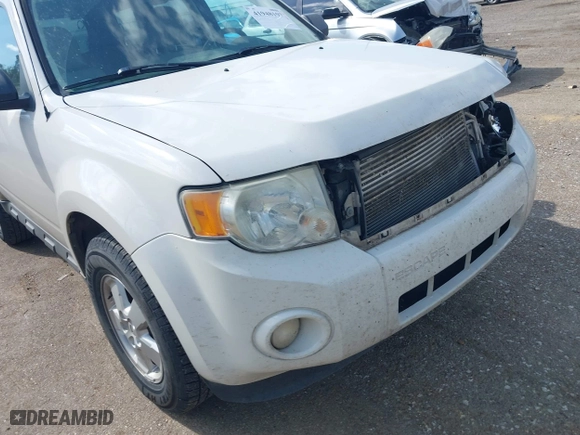 2010 Ford Escape XLT with VIN 1FMCU0DG3AKC46213, listed as a IAAI auction lot 41948197 with 167,761 mi miles. Bid and sale history available at carsss.com. Image 13.