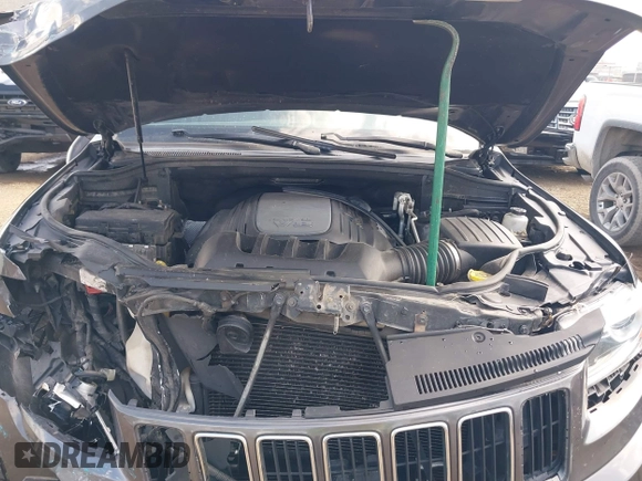 2014 Jeep Grand Cherokee Limited with VIN 1C4RJFBT4EC349957, listed as a IAAI auction lot 42118241 with 127,168 mi miles and . Bid and sale history available at DreamBid. Image 10.