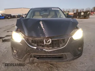 2014 Mazda CX-5 Grand Touring with VIN JM3KE4DY9E0366667, listed as a Copart auction lot 88707365 with 140,115 mi miles and Salvage Title. Bid and sale history available at carsss.com. Image 5.