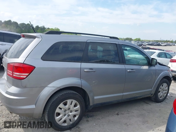 2017 Dodge Journey SE z VIN 3C4PDCAB0HT694918, wystawiony jako IAAI lot #42010594 z przebiegiem 135 432 mil mil oraz . Historia ofert i sprzedaży dostępna na DreamBid. Obrazek 13.