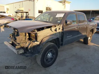 2021 Toyota Tacoma SR z VIN 3TYAX5GN2MT020997, wystawiony jako IAAI lot #40991578 z przebiegiem 81 509 mil mil oraz . Historia ofert i sprzedaży dostępna na DreamBid. Obrazek 2.
