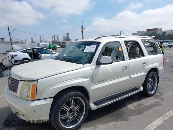 2003 Cadillac Escalade z VIN 1GYEK63N93R319255, wystawiony jako IAAI lot #42371706 z przebiegiem 171 656 mil mil oraz . Historia ofert i sprzedaży dostępna na DreamBid. Obrazek 6.