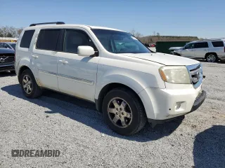 2011 Honda Pilot Touring z VIN 5FNYF3H9XBB044579, wystawiony jako Copart lot #50303125 z przebiegiem 227 482 mil mil oraz Szkoda całkowita • Salvage title. Historia ofert i sprzedaży dostępna na DreamBid. Obrazek 4.