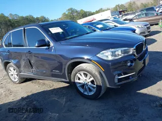 2014 BMW X5 xDrive35d with VIN 5UXKS4C52E0J96532, listed as a IAAI auction lot 41763066 with 153,634 mi miles. Bid and sale history available at carsss.com. Image 13.