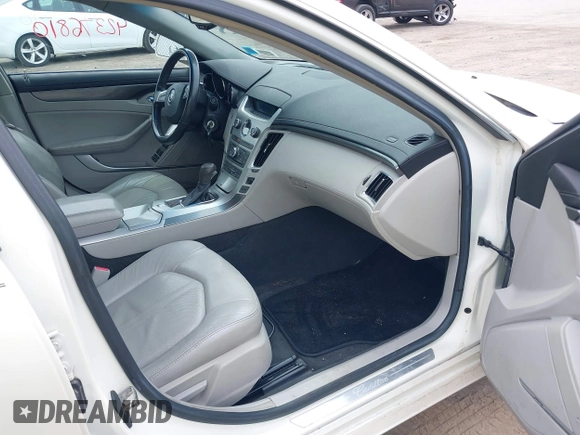 2009 Cadillac CTS RWD with VIN 1G6DF577290173180, listed as a IAAI auction lot 42376810 with 135,111 mi miles and . Bid and sale history available at DreamBid. Image 5.