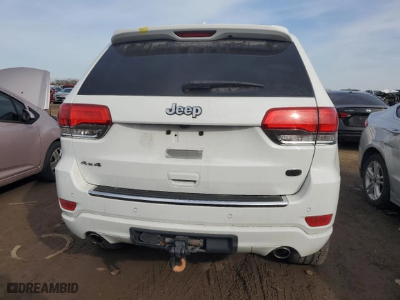 2014 Jeep Grand Cherokee Overland with VIN 1C4RJFCT0EC417458, listed as a Copart auction lot 48435715 with 82,855 mi miles and Salvage Title. Bid and sale history available at carsss.com. Image 6.
